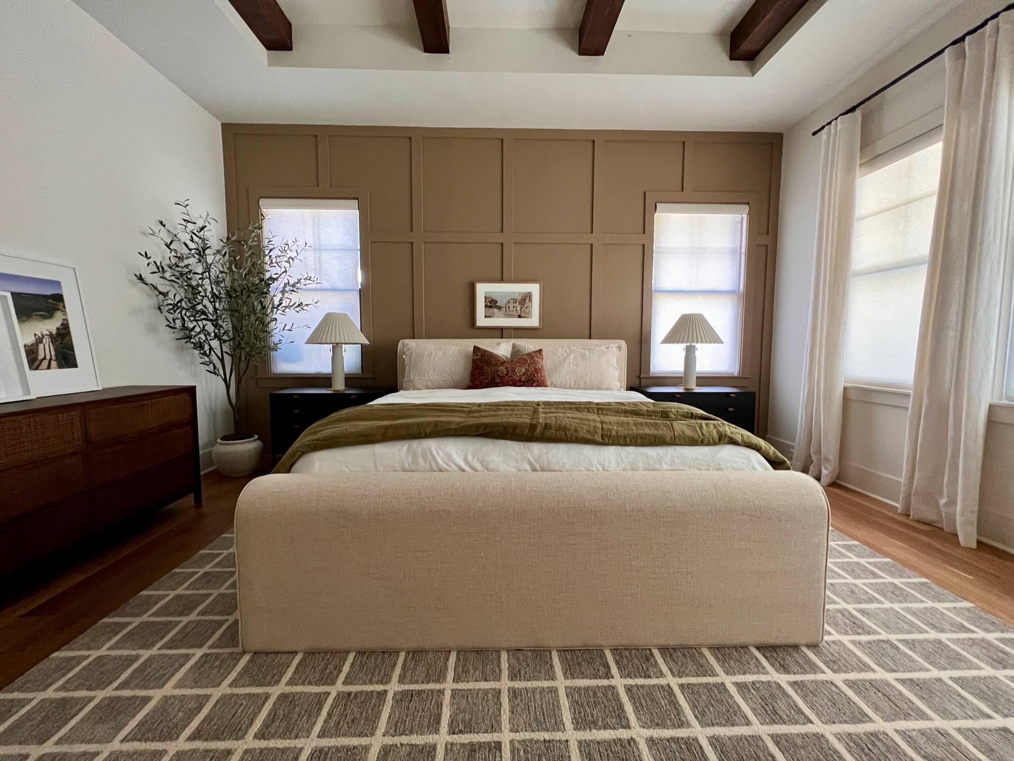 This timeless master bedroom accent wall gives the room a focal point.