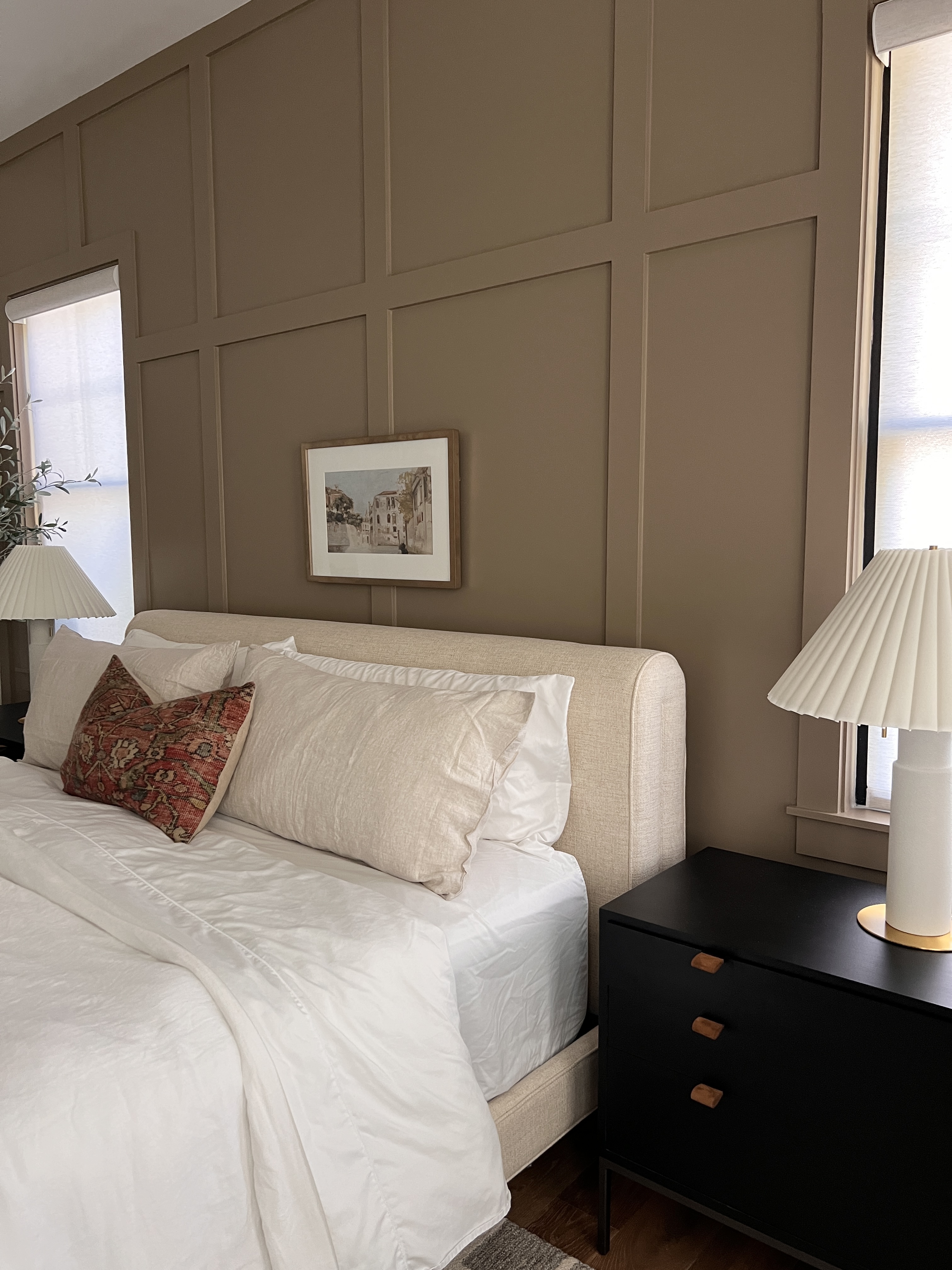  This master bedroom accent wall adds character and visual appeal to this wall. 