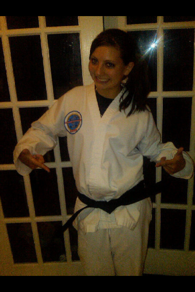  Junior Interior Designer Shelly McDonald is a blackbelt in taekwondo. Here she shows off her black belt. 
