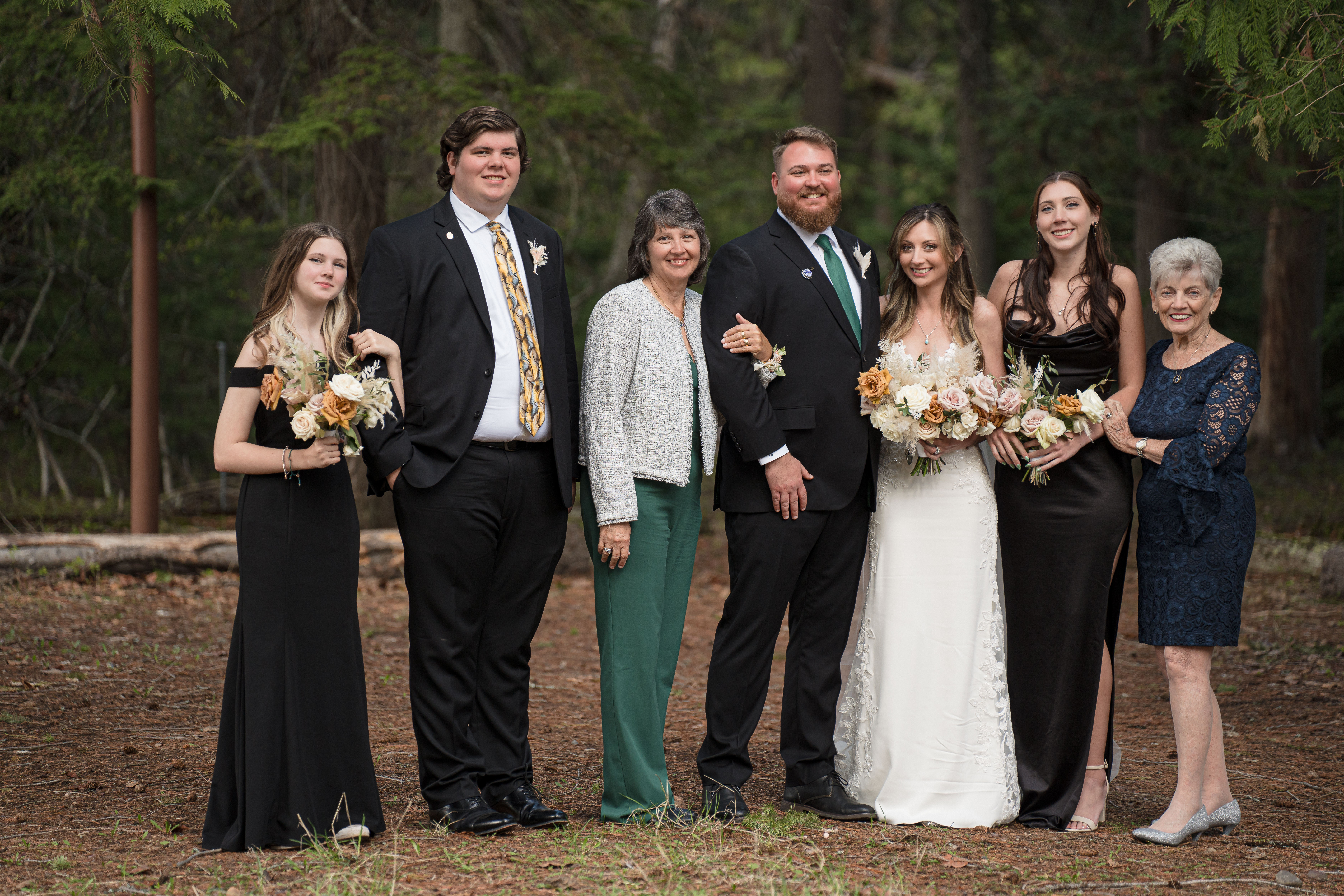 Junior Interior designer Shelly McDonald and family gather around to take a photo.