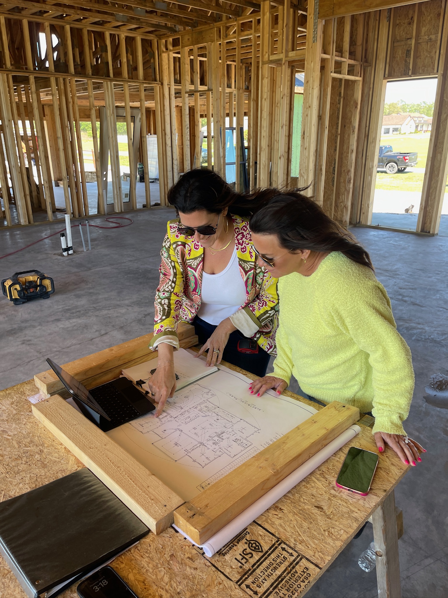 Jessica Woodward of Welcome Home Styling inspects a new construction home as it is being built during one of her regular site visits to check on the progress of the construction. 