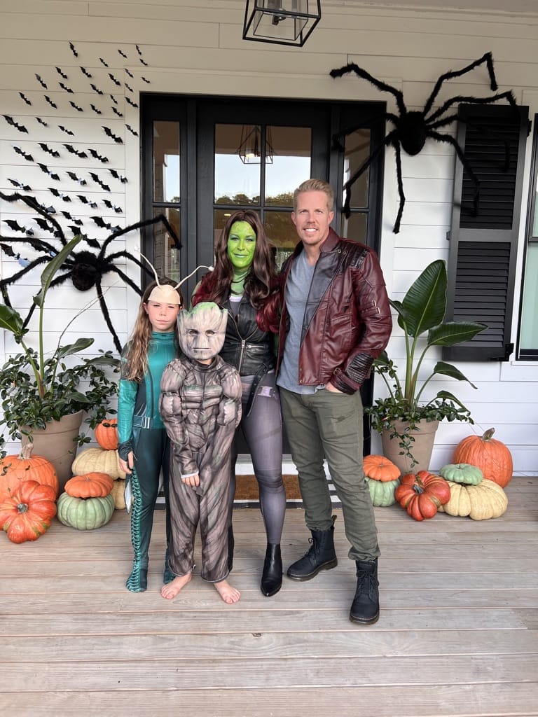 Jessica Woodward and family take a picture on their front porch all dressed up in their Guardians of the Galaxy themed Halloween costumes. 