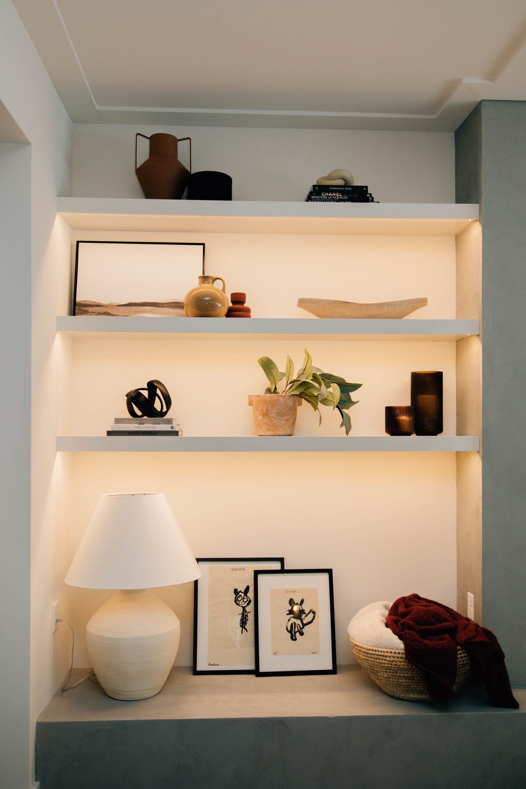 This built in shelving unit’s decor is changed throughout the season. Here is exhibits the beautiful colors of fall. 
