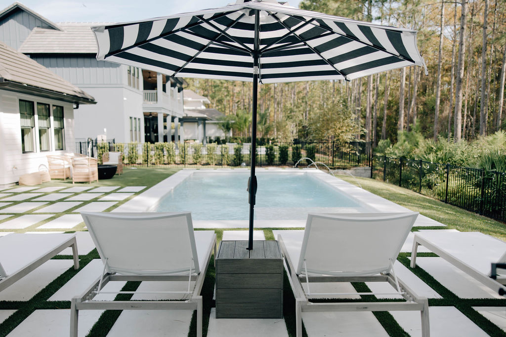 A beautifully curated pool area with entertaining and relaxation area.