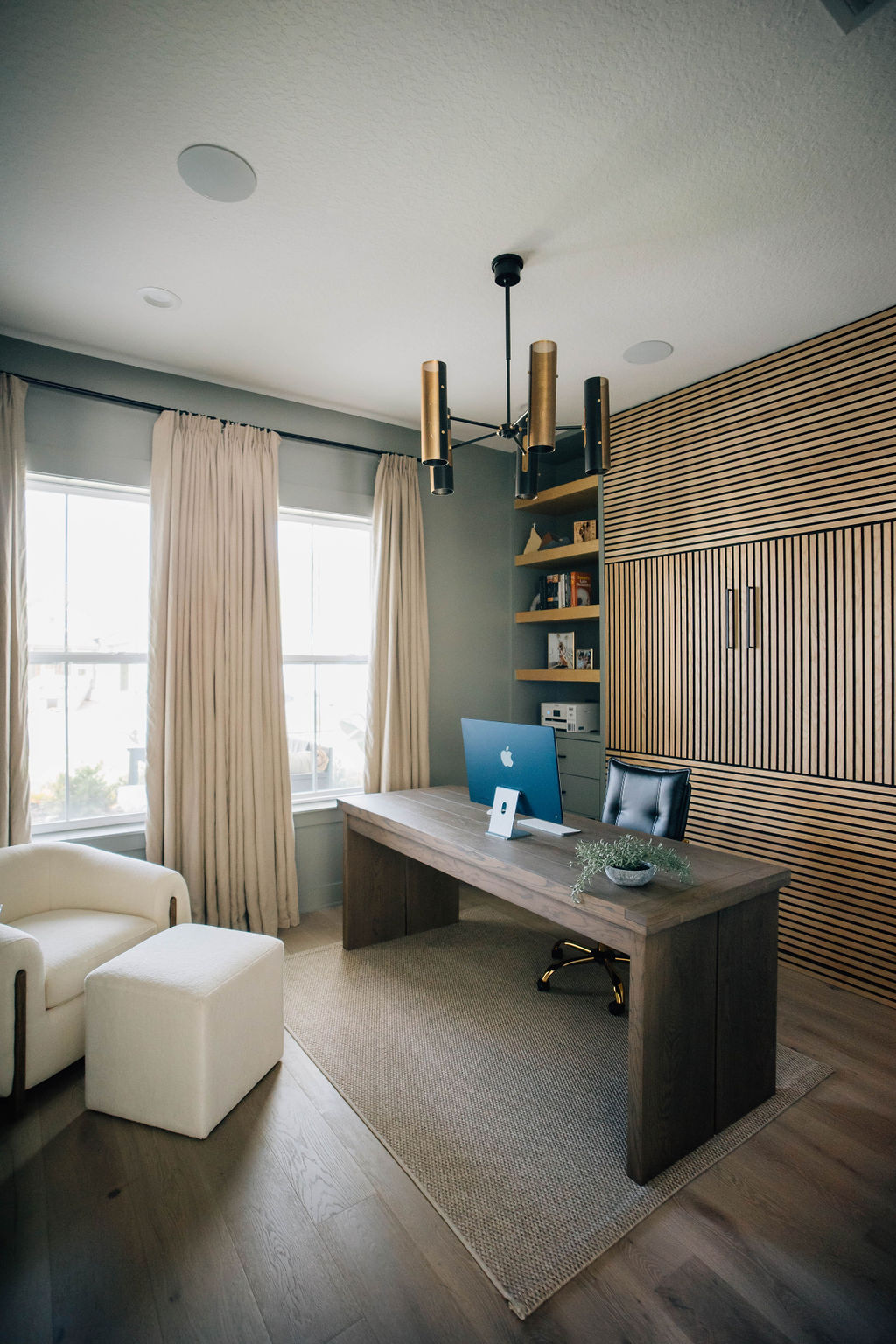 office area with custom built-in with murphy bed and storage.