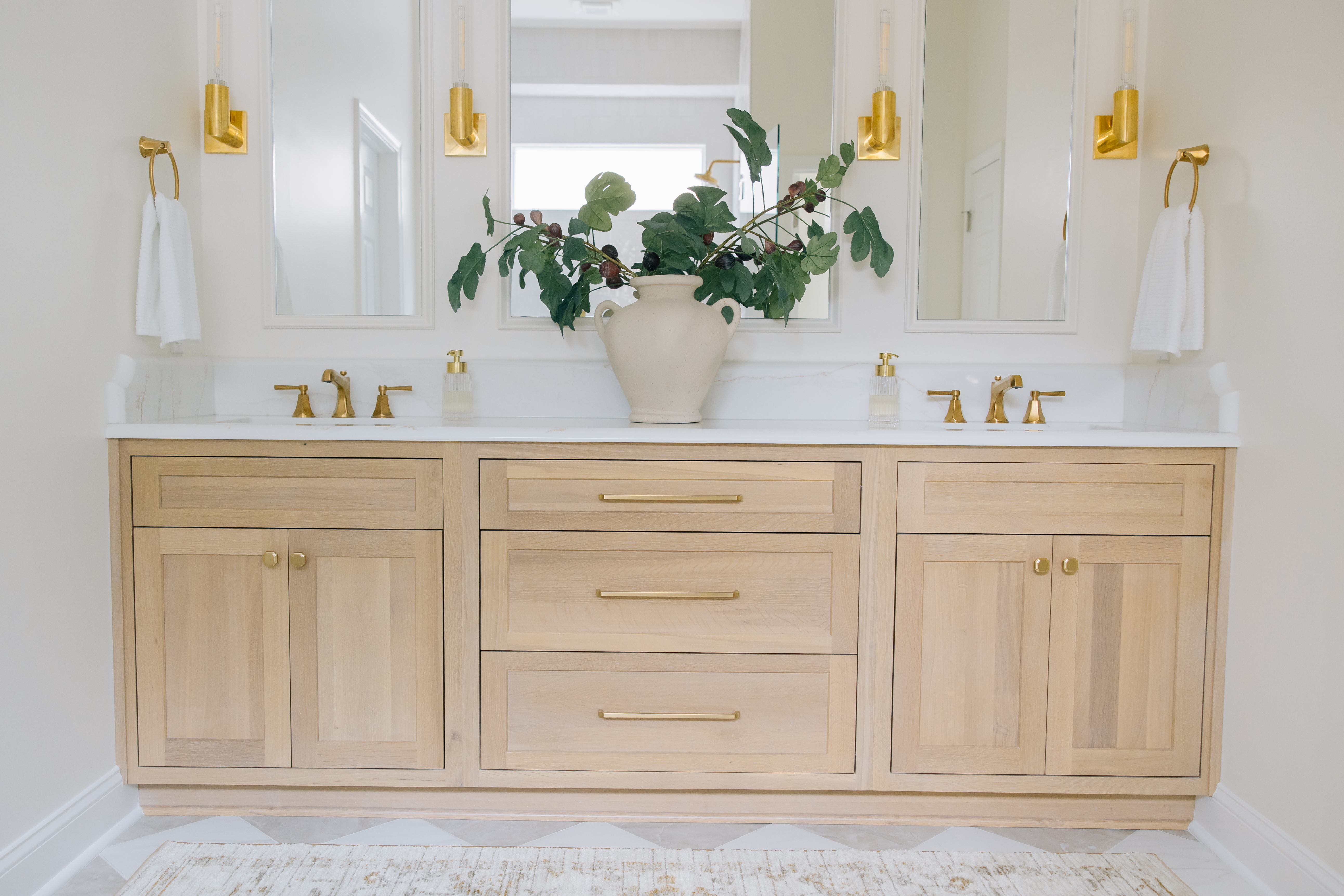 These calming, warm tones offer depth without dominating this bathroom design.
