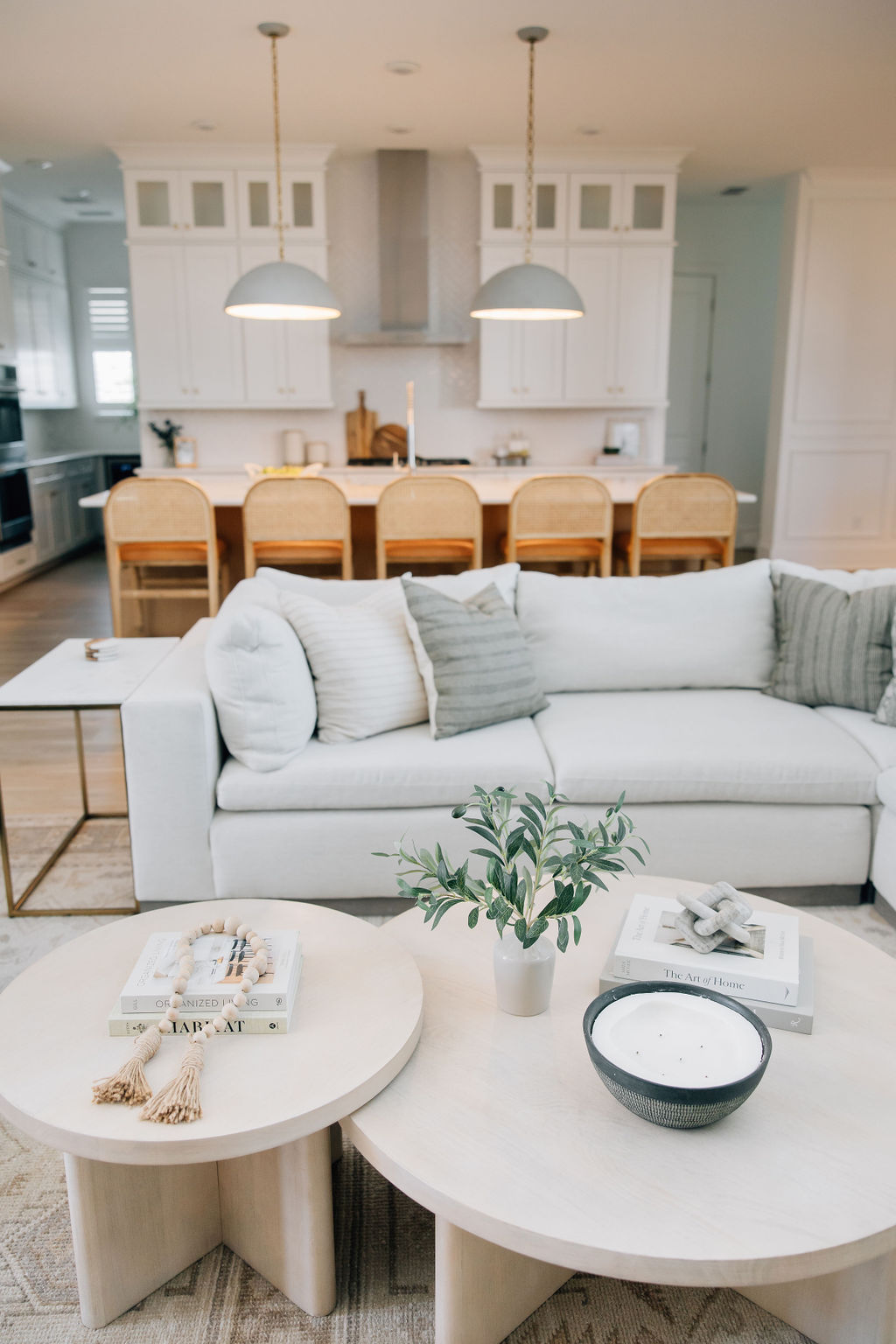 Layered kitchen lighting and open concept design that help avoid poor lighting placement, one of the most common renovation mistakes.